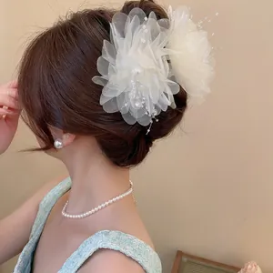 Elegant white mesh flower hair claw clip with faux pearls and organza petals for women