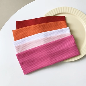 Five-piece set of wide elastic knitted ribbed headbands in multiple vibrant colors