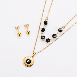 Parure de bijoux dorés avec collier et boucles d'oreilles à motif œil maléfique et perles