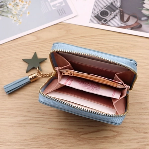 Mini sky blue leather wallet with pink accordion interior and star tassel charm
