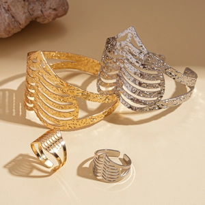 Textured hollow metal cuff bracelet and ring set in gold and silver finish