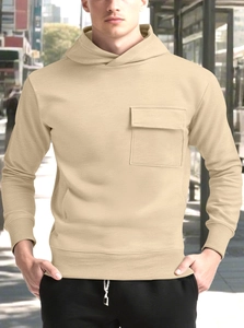 Detail of solid beige drawstring hoodie with long sleeves and front chest patch pocket