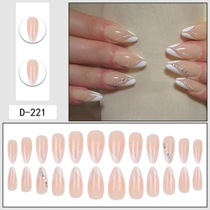 Faux ongles amande style français avec vagues blanches et strass colorés brillants