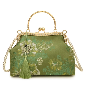 Green silk shell bag with floral embroidery, pearl chain strap, and butterfly tassel
