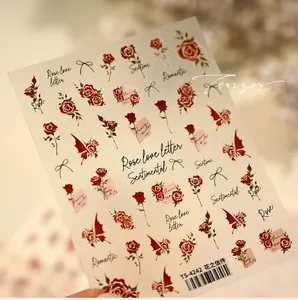 Detailed view of TS-4242 rose nail stickers with butterflies and letter motifs