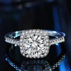 Classic moissanite halo engagement ring in silver finish with pavé set band