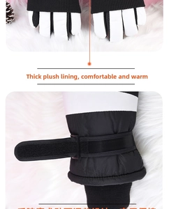 Detail showing thick white fleece lining and adjustable velcro strap of winter gloves