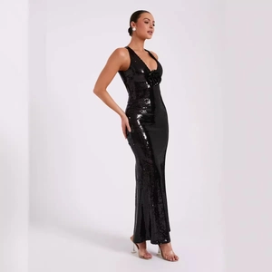 Elegant black sequin evening gown with deep V-neck and 3D floral accent in a slim fit