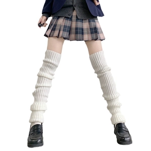 JK style white knitted leg warmers for women with a ribbed texture and slouchy winter look