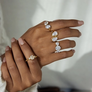 Macro of stackable 18K gold plated stainless steel rings with sparkling zircons