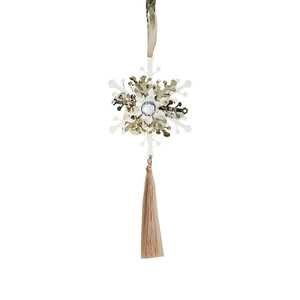 White snowflake Christmas tree ornament with gold tassel and sparkling gemstone centerpiece
