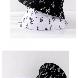Close-up of graffiti street style print on cotton fabric for foldable bucket hats