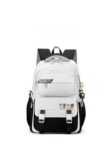 Detailed front view of a black and white high-capacity school backpack with bear keychain