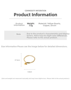 Detail von gelbem Rutilquarz-Armband mit grünen Akzenten und goldenem Hulu-Anhänger