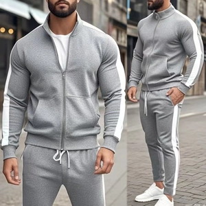 Detail view of grey men's tracksuit with stand collar jacket and side striped joggers