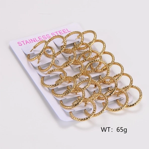 Detail view of twelve pairs of golden stainless steel hoop earrings with hammered texture