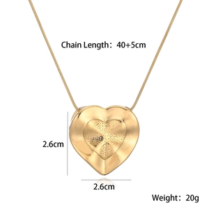 Detail view of 18K gold heart pendant with dimensions and chain length specifications