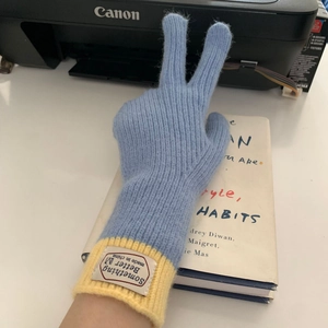 Thick knit blue and yellow touch-screen gloves with rib cuff and woven label