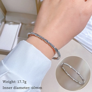 Detailed view of silver titanium steel bangle with 60mm diameter and 17.7g weight
