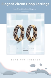 Detailed view of leopard print gold hoops featuring pave-set cubic zirconia crystals