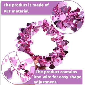 Macro detail of flexible pink heart tinsel garland with PET sequins and iron wire