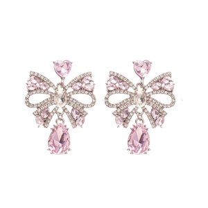 Boucles d'oreilles nœud argentées avec cristaux roses en cœur et goutte d'eau