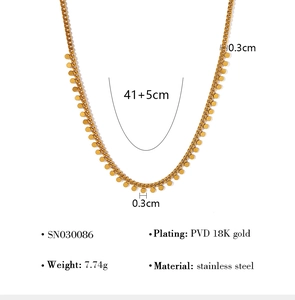 Detail view of 18K gold PVD plated stainless steel necklace with 0.3cm round pendant