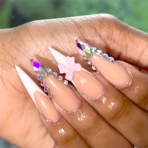 Long stiletto press-on nails with French white tips, 3D pink bow and rhinestones