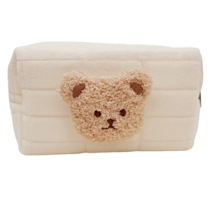 Quilted cream fleece stationery bag with a brown embroidered bear patch decoration