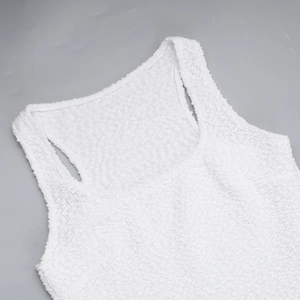 Close-up of white knitted texture and square neckline on the casual two-piece set