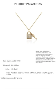 Close-up of 925 sterling silver lock and key pendant with micro-inlaid zircons