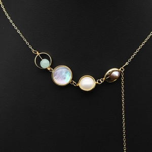 Natural freshwater pearl necklace with asymmetric gemstone pendants on gold chain