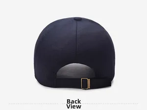 Detail view of navy blue baseball cap back with adjustable metal buckle and cotton texture