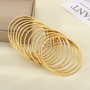Lot de 12 joncs minimalistes en acier inoxydable plaqué or 18 carats empilables