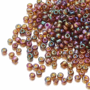 Macro detail of iridescent 2mm glass seed beads for DIY jewelry and tassels