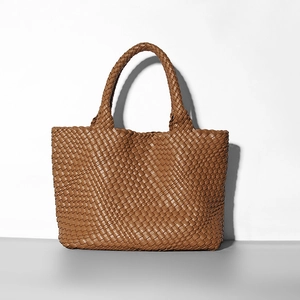 Chic brown woven tote bag for women with elegant wide-weave texture and sturdy handles