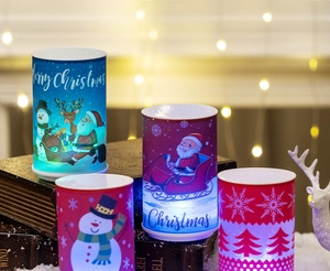 Detail of Christmas lantern with Santa graphics on vintage books and warm lights