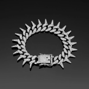 Detailed view of silver 20mm iced-out thorn Cuban link chain with square box clasp