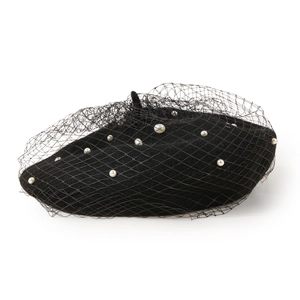 Elegant black wool beret with white pearls and black mesh veil in a chic French style