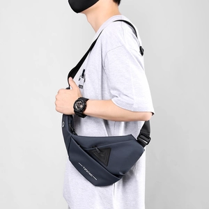 Close-up of waterproof fabric and geometric design on the crossbody chest bag