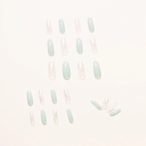 Icy blue glitter press on nails set in long coffin shape for elegant manicure design