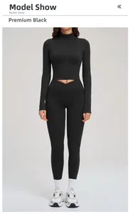 Premium black yoga set featuring long sleeve zip-up top and high waist leggings