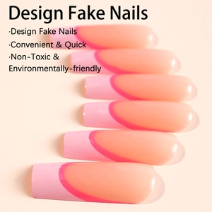 Long french pink ombre press-on nails in tapered coffin shape with glossy finish