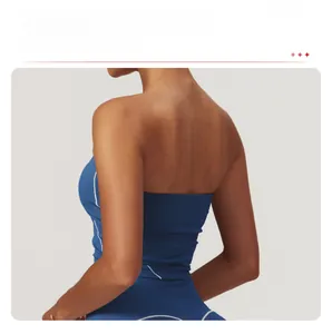 Close-up of deep blue backless sports top showing seamless fit and minimalist design