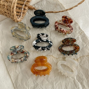 Set of 8 French style oval resin hair claws in tortoiseshell and marble patterns