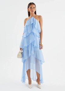 Front full view of light blue chiffon maxi dress with layered ruffles and halter neck design