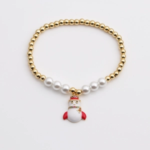 Bracelet de Noël avec pendentif bonhomme de neige, perles dorées et perles blanches