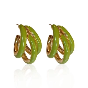 Minimalist gold-plated triple layer C-shaped earrings with bright green enamel accents