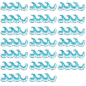 Macro detail of blue wave embroidery patches showing fine thread work and texture