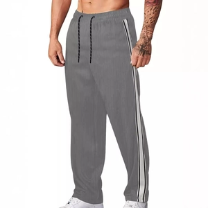 Pantalon de sport gris en velours côtelé pour homme avec bandes latérales